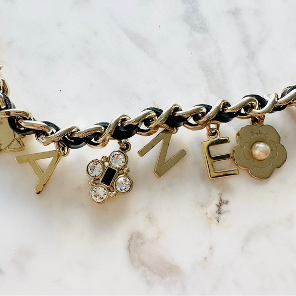 CHANEL Lambskin Crystal CC Logo Charming Necklace in Gold and Black - Picture 5 of 13